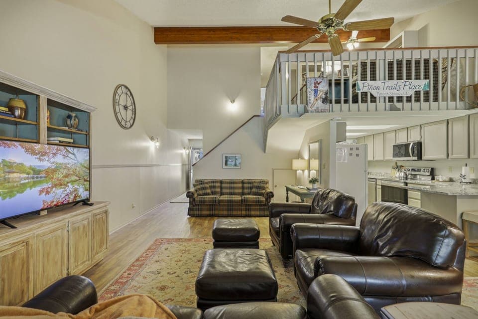 Plenty of seating options, a queen sofa bed, large gas fireplace and smart tv complete this open concept main floor space. Welcome to Pagosa!