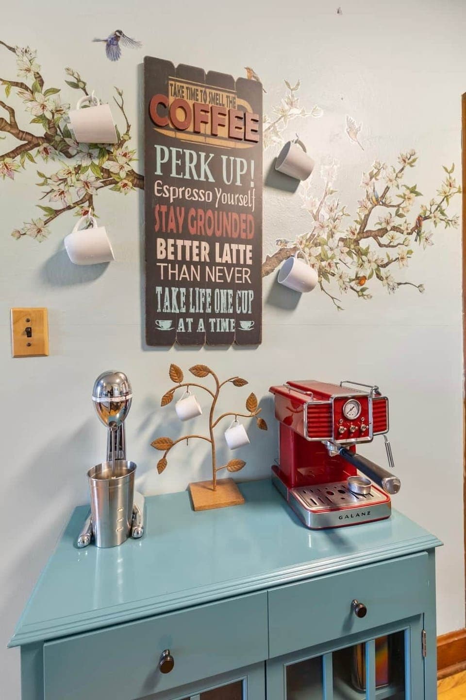 Coffee station with espresso machine and vintage style milk shake blender.
