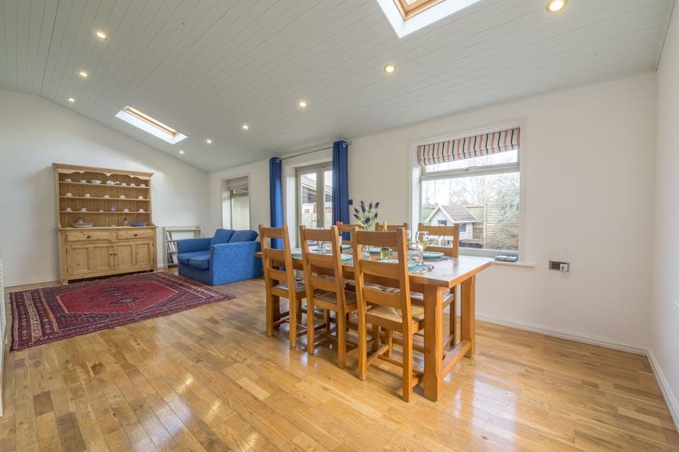 Ground floor:  Family/ garden room with wooden floors and feature skylights
