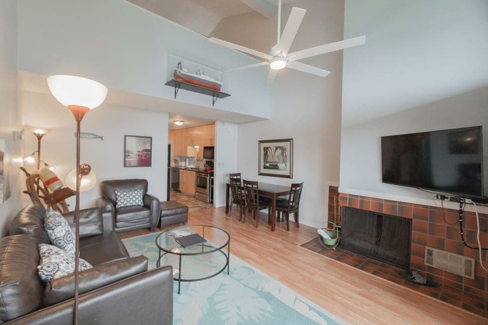 The Whale Watcher Suite features a spacious gathering space for relaxing evenings by the coast.