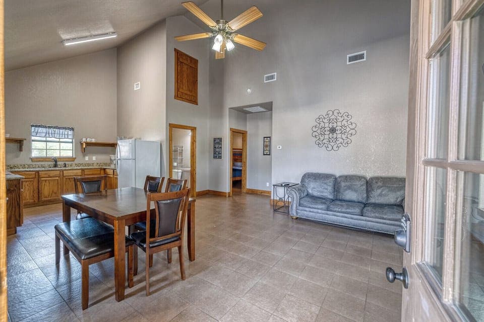 Living and Dining area.  Couch is a sofa bed.
