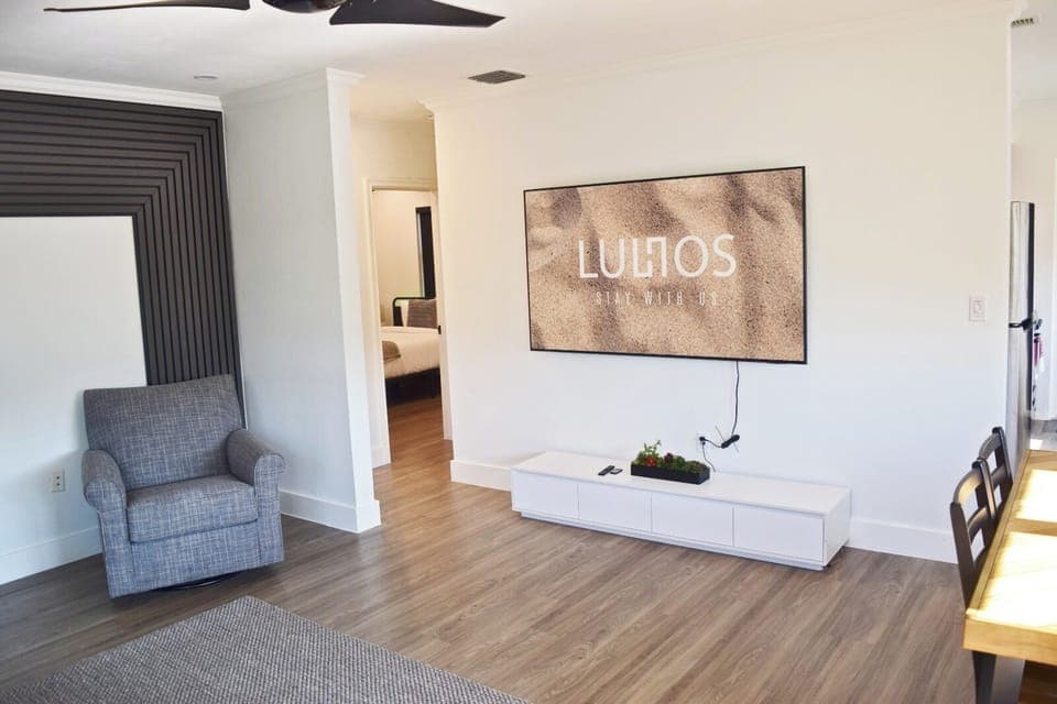 Bright and inviting living room with modern décor and cozy seating 