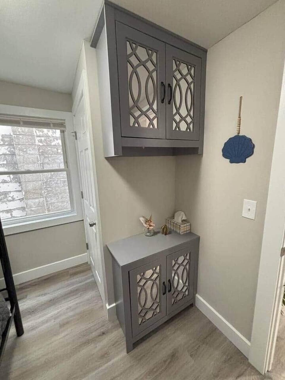 The built in cabinets provide additional space if someone needs to catch up on some work.  