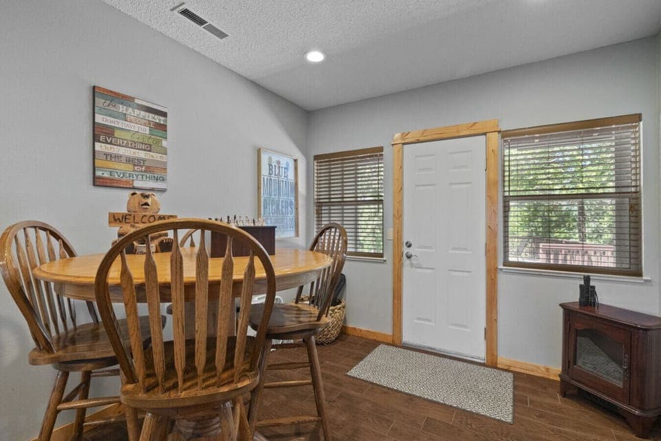 Enjoy the faux fireplace at the 4 top pub table