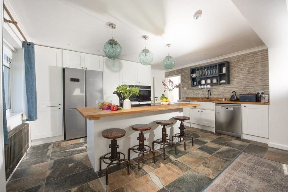 Kitchen with Breakfast Bar - Sennen Sand by Stay Ca Holidays