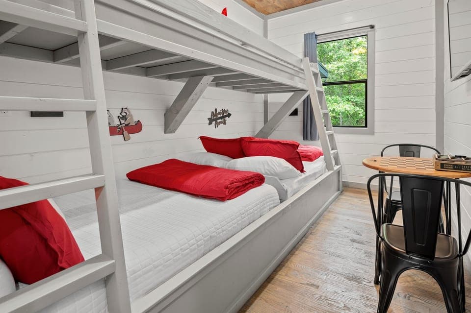 Bunk Room with 2 Twin over Full Bunk Beds and TV