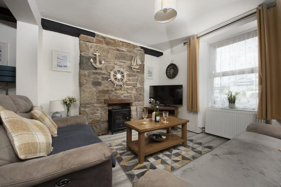 Living room is open plan with the kitchen and dining area with Smart TV, seating 6 - Bryher Cottage, Stay Ca Holidays