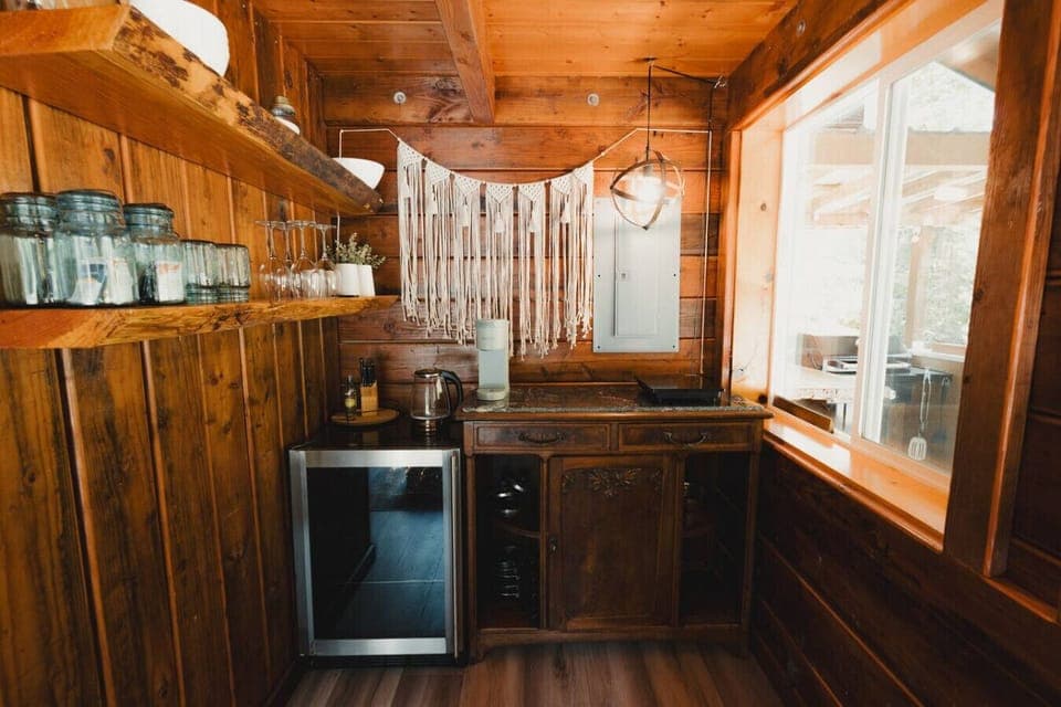 Stocked kitchenette with cookware, dishes & everything you need for simple meals.