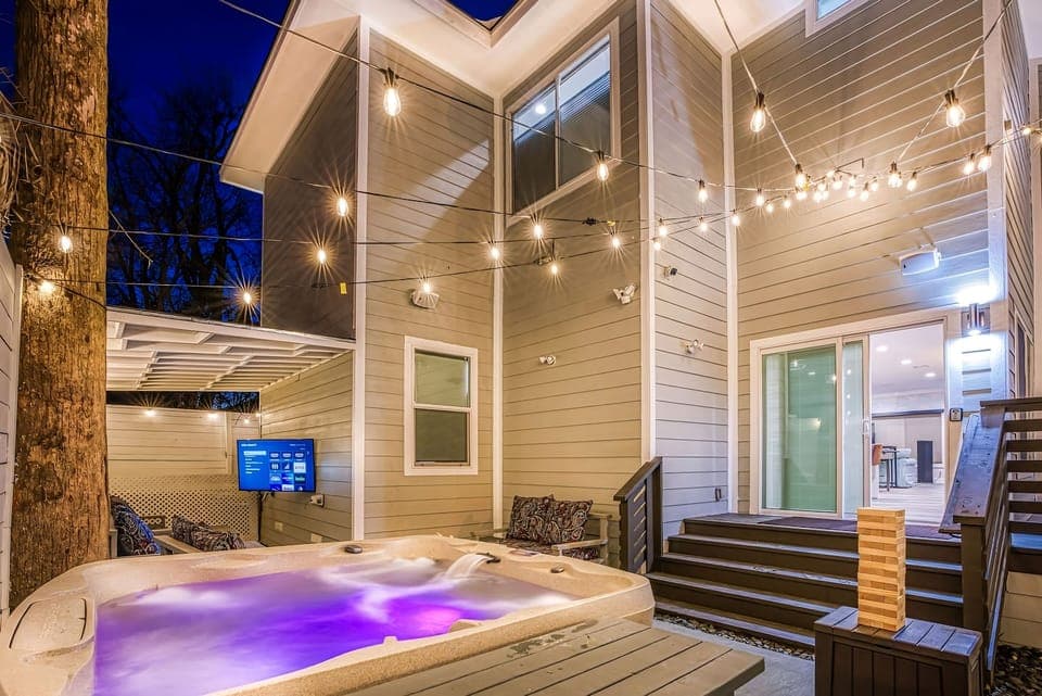 Play, relax, and soak in the colorful vibes of this inviting hot tub.