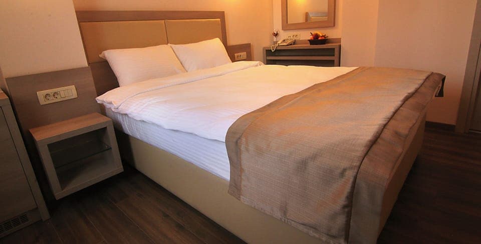 Unit with Double bed. Exact unit will be assigned upon arrival. Views, colors, and decor may vary.