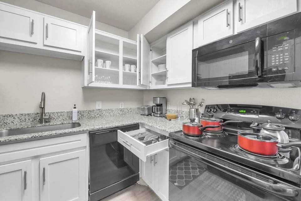 Functional kitchen setup ideal for home-cooked meals.