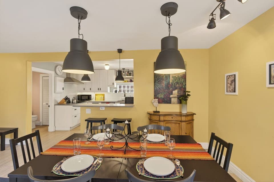 Dining room and extra countertop seating adjacent to kitchen