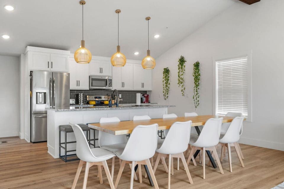 Modern kitchen and long dining table make group meals easy, whether it’s a cozy breakfast or a family-style dinner.