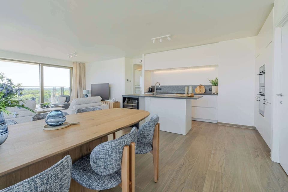 Inviting dining area seamlessly blending into the kitchen.