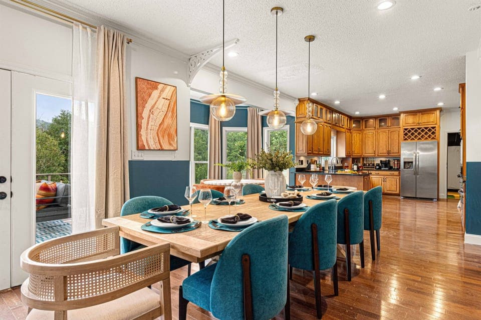 Elevated family dining with views—ample seating for group feasts or relaxed breakfasts in the mountains.