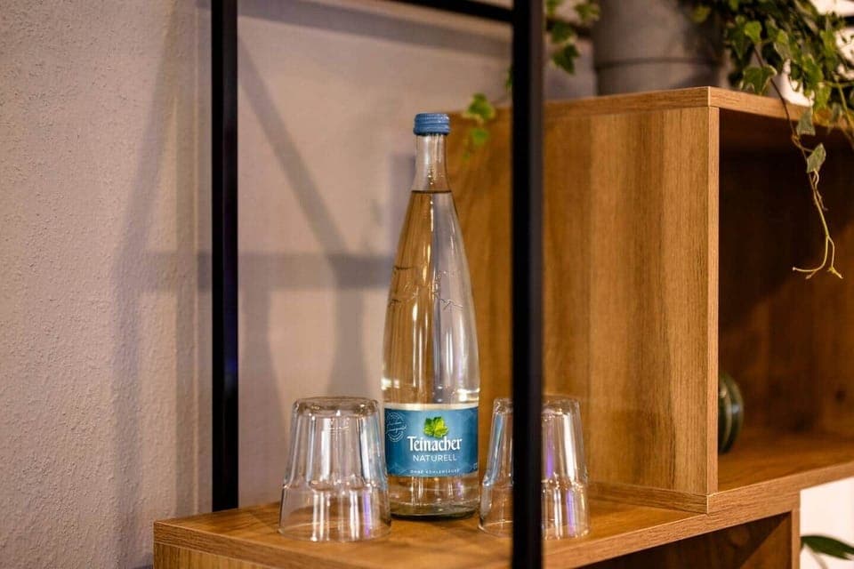 Drinking is important! Enjoy a glass of water - a bottle will be provided free of charge upon arrival.