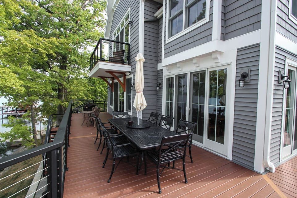 Host family dinners or gatherings with a large outdoor dining table and lake breeze as your backdrop.