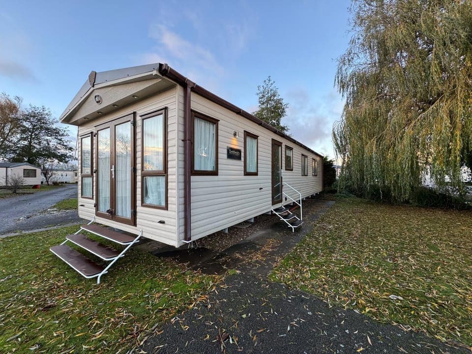 Charming cozy exterior with peaceful yard retreat