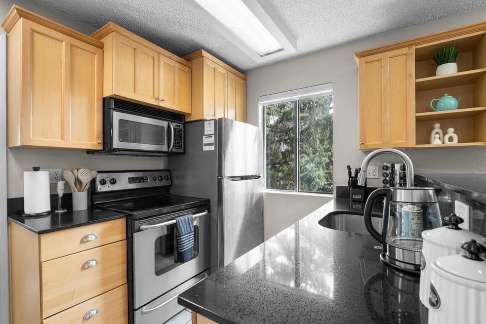 Fully stocked kitchen and coffee station.