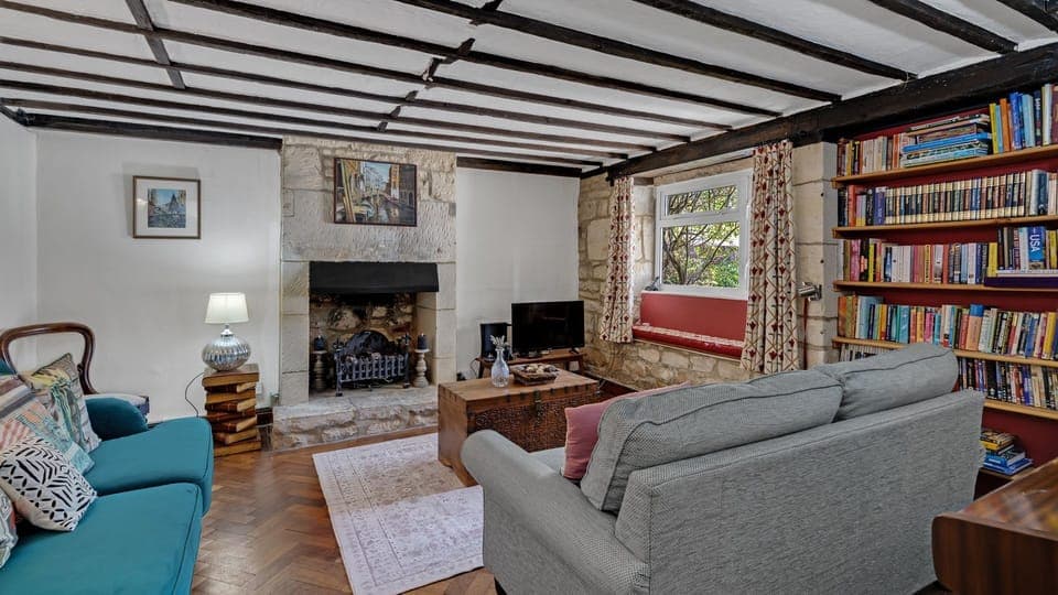 Part of the original cottages, the living room is a cosy getaway.