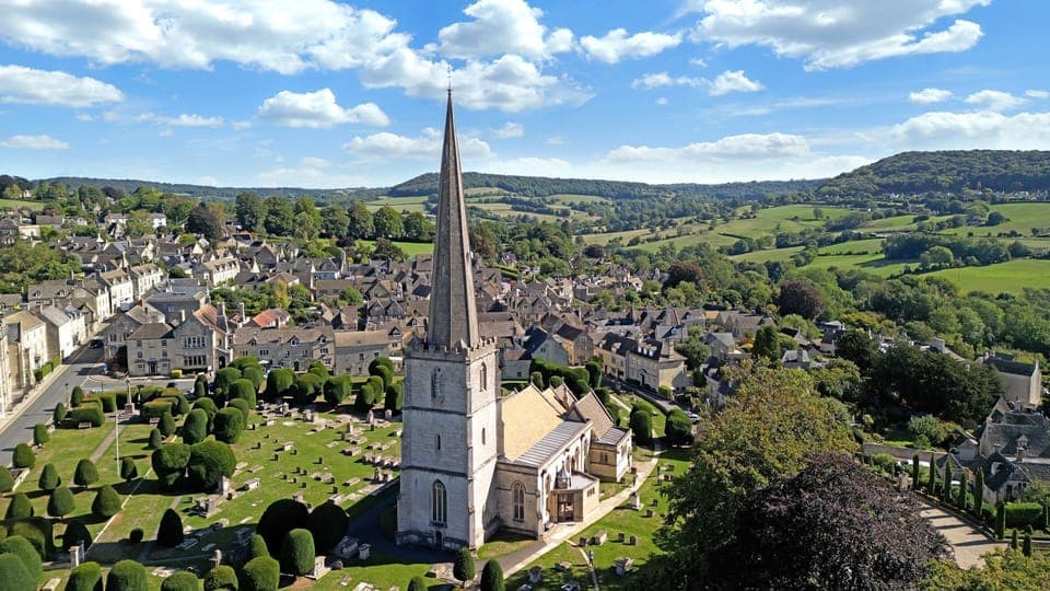 Visit the well-known church where the devil will not allow a 100th yew tree to grow.