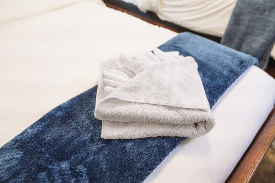 Comfortable sleep space with fresh linens.