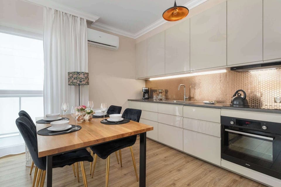 The fully equipped kitchenette includes everything you need for a home-cooked meal.