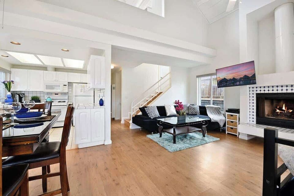 The open spaced living room with vaulted ceiling creates a perfect space for family and friends to gather and create memories