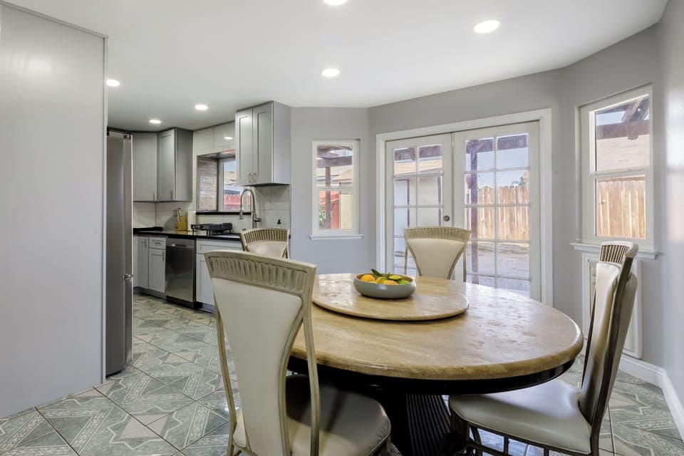 Open living-to-dining layout with great natural light and backyard access.