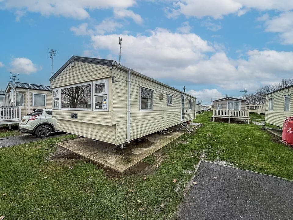 Cozy exterior of a charming vacation home with open skies
