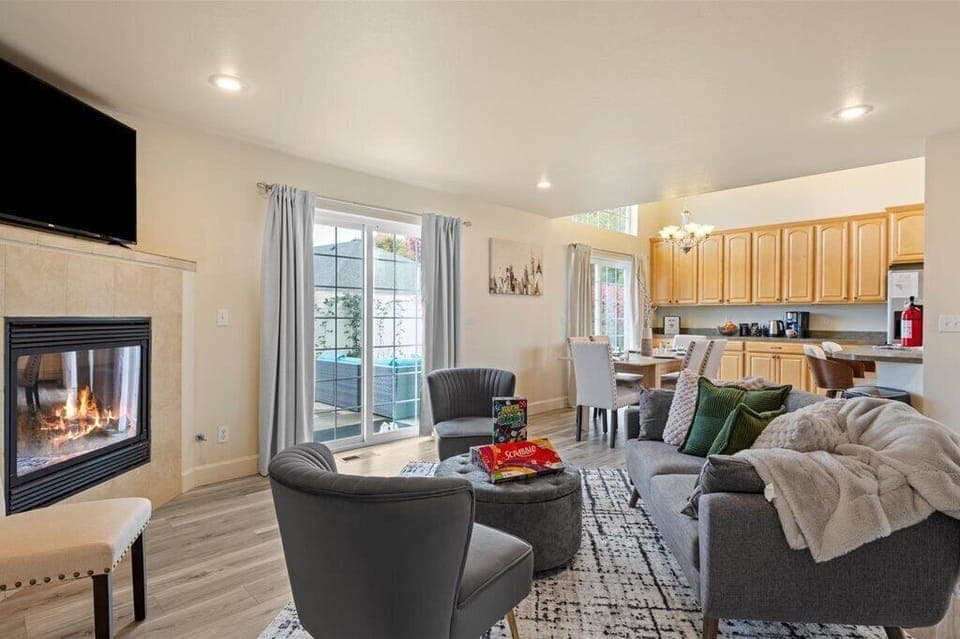 Bright open layout with fireplace and dining area perfect for gatherings