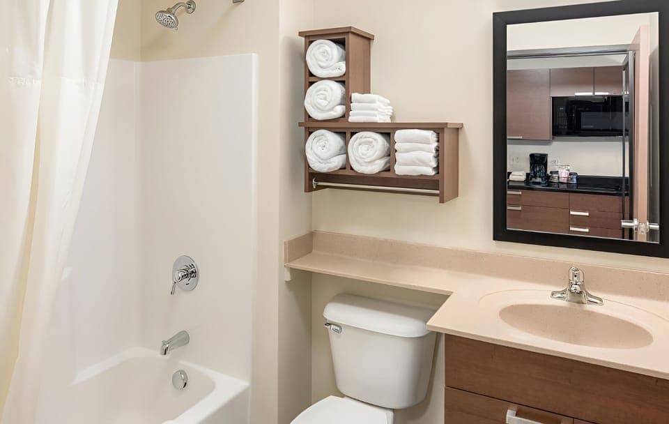 Refresh in a spotless bath with plush towels ready.