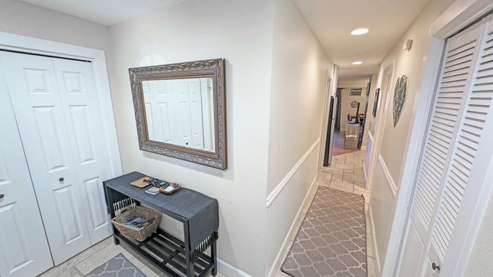 Down the hall is the Laundry, Bath and Bedroom 2