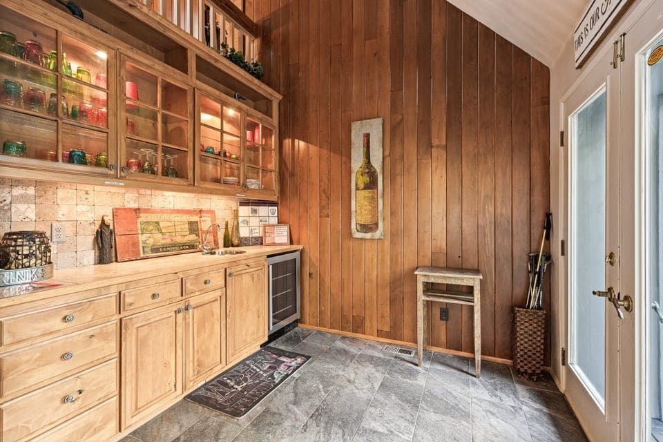 Little bar area off living room and heads out to the back patio and pool area