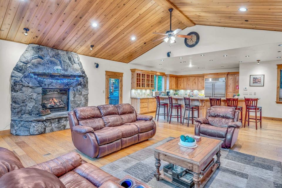 Living room (upper floor): Gas fireplace, 55” Smart TV, Pioneer surround sound, ceiling fan