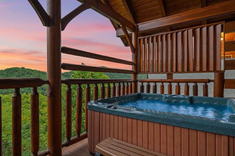 Slip into the bubbling hot tub and let your cares melt away as you soak under the glow of a Smoky Mountain sunset. This covered deck is the perfect retreat for stargazing or unwinding after a day of adventure.