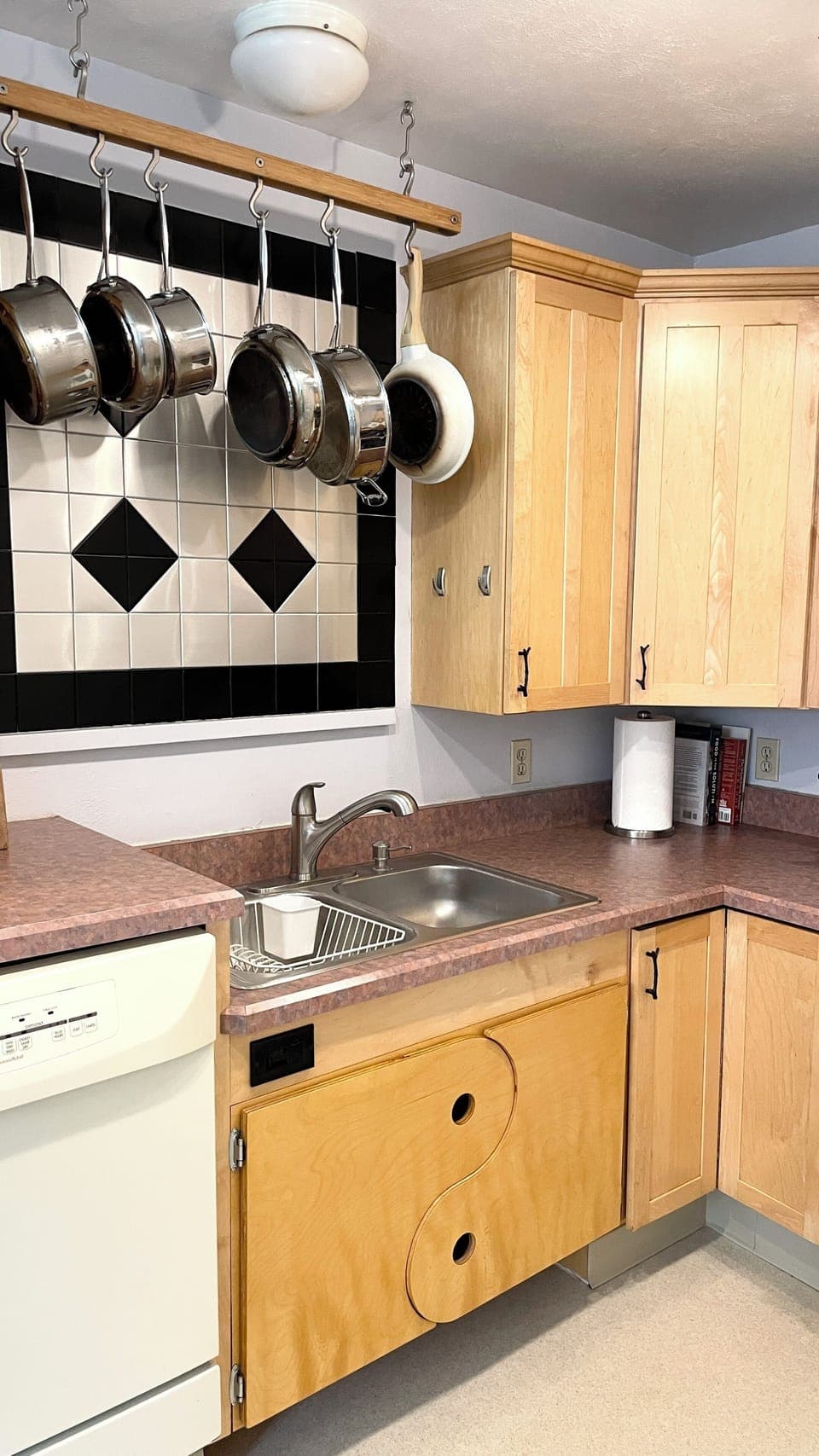 Fully stocked kitchen for cooking.