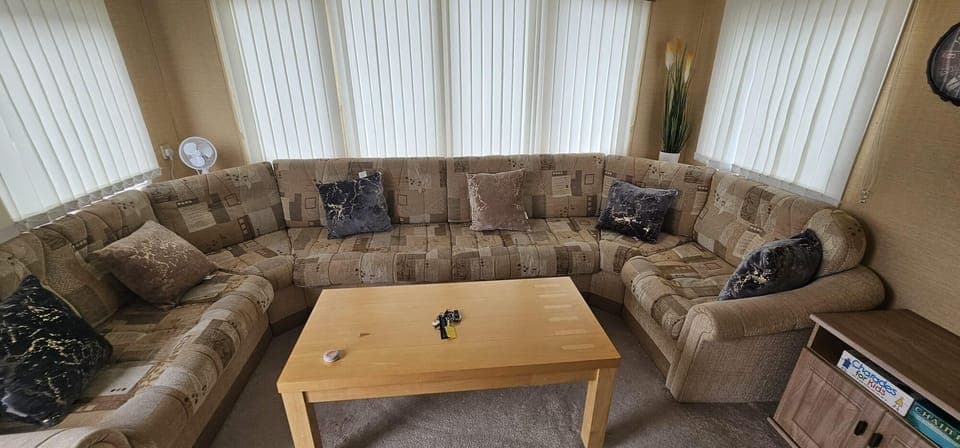 Cozy living room with plush sectional and natural light