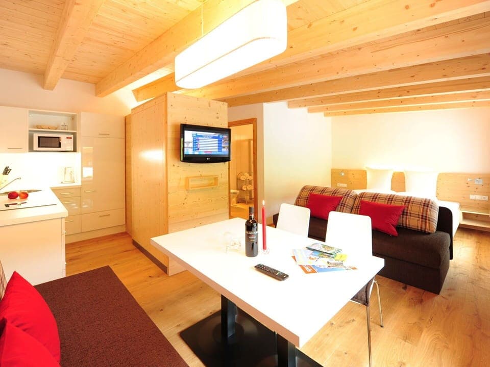 Interior Design, Ceiling, Room, Apartment, Living Room, Wood Stain, Hotel, Hardwood, Houseplant