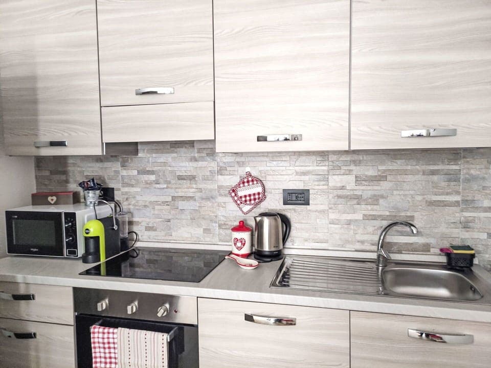 Kitchen, Countertop, Kitchen Appliance, Cabinetry, Interior Design, Major Appliance, Home, Flooring, Sink, Home Appliance