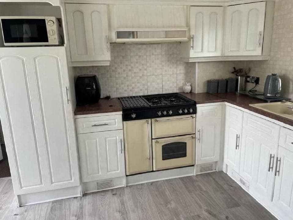 Cozy kitchen with vintage stove and modern amenities