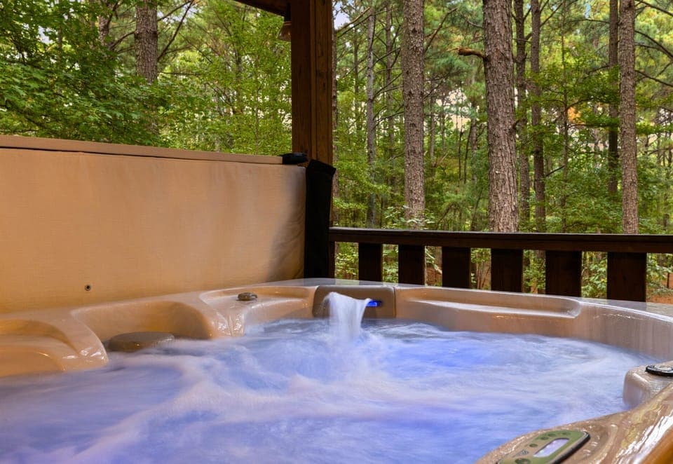 Unwind in a steaming hot tub on your private deck, surrounded by nothing but tall pines and the sound of nature all around you.