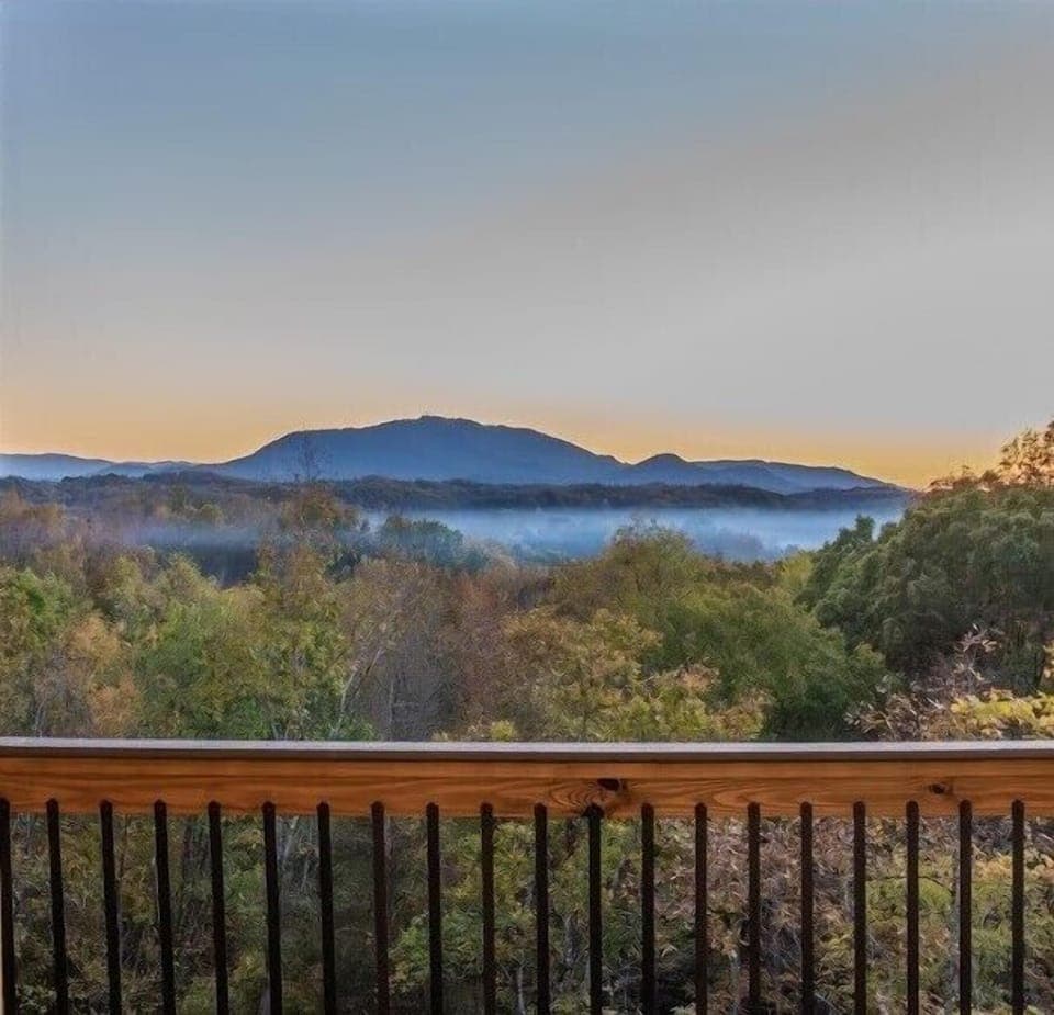 Sister Cabin Photo - Breathtaking Mountain Serenity: Wake up to nature's masterpiece with panoramic views that stretch beyond the horizon.