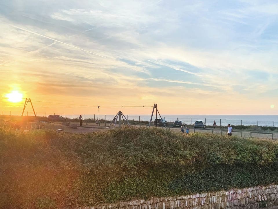Views over the playground and Golf Club to the sea | Atlantic Hideaways, Newquay