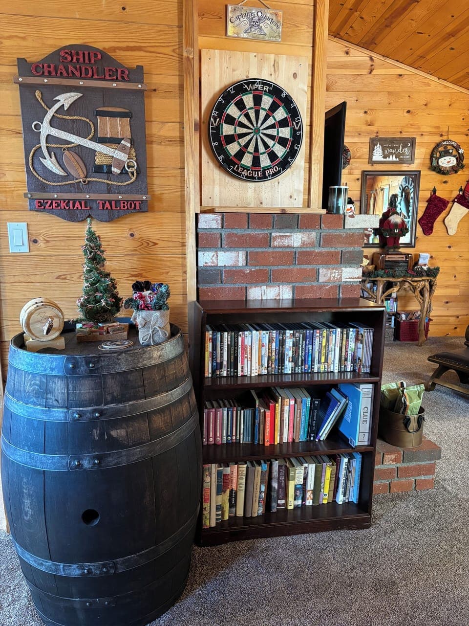 Dartboard, books, games, puzzles, cards, DVDs and activities in the living room.