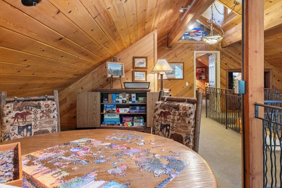 Upstairs TV and game room offering additional hangout space.