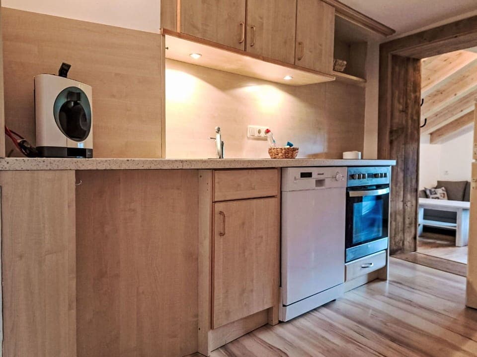 Furniture, Flooring, Wood, Interior Design, Floor, Cabinetry, Ceiling, Countertop, Kitchen, Room