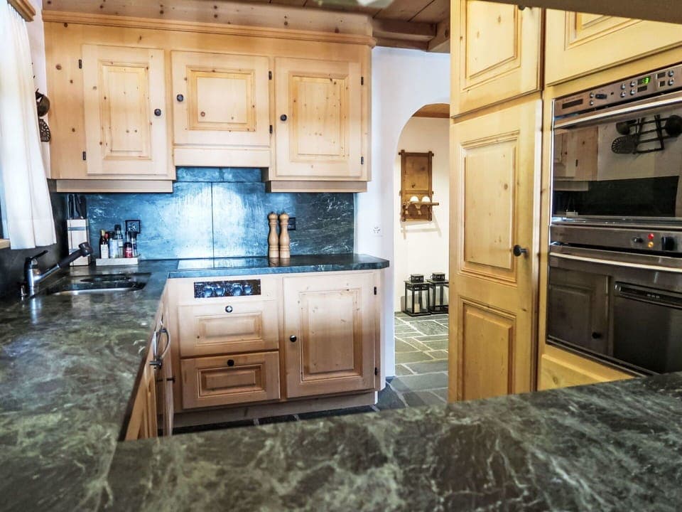 Kitchen, Countertop, Cabinetry, Wood, Flooring, Interior Design, Kitchen Appliance, Furniture, Floor, Kitchen Stove