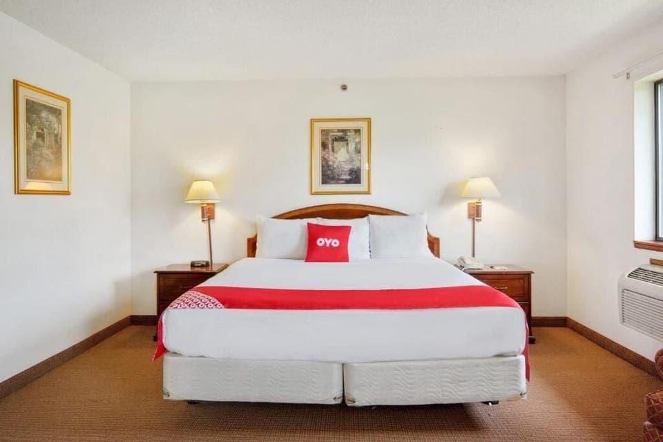 Unwind into crisp linens for a restful night’s sleep.