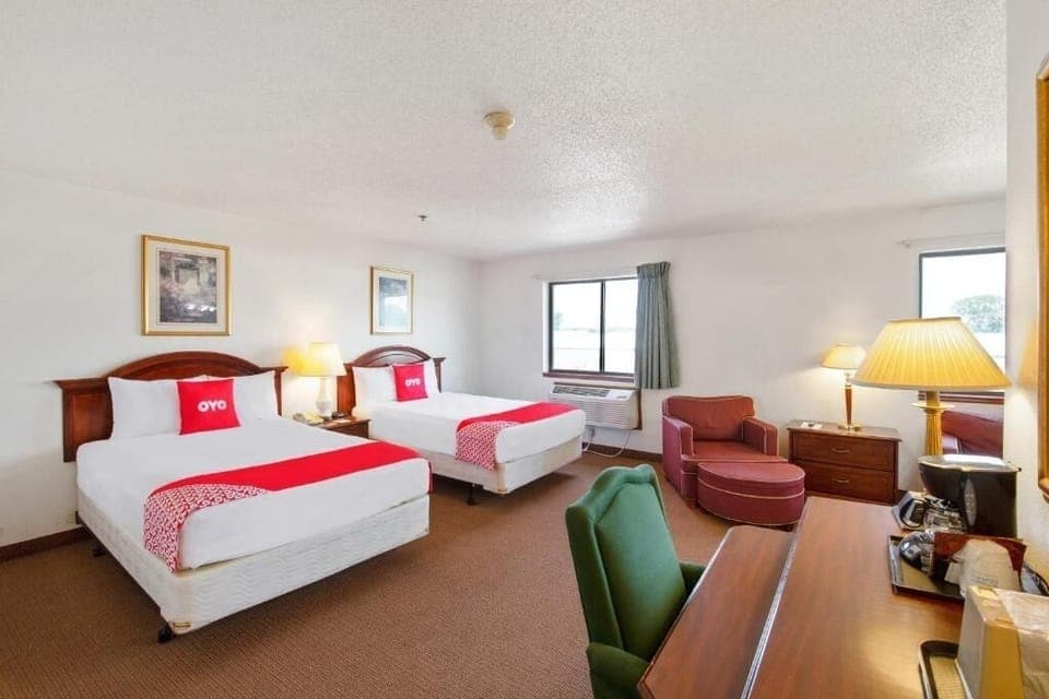 Recharge after adventures with two beds and a handy workspace.